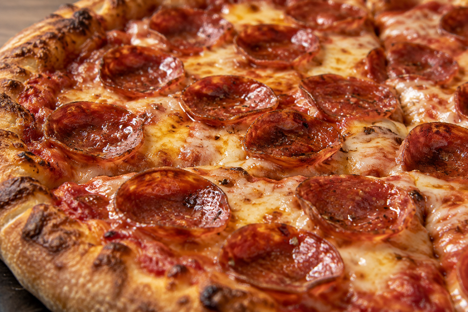 AI-generated preview image: close-up of pizza texture for Buzzy’s Pizzeria